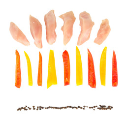 Preparing chicken stir fry with vegetables and spices, isolated