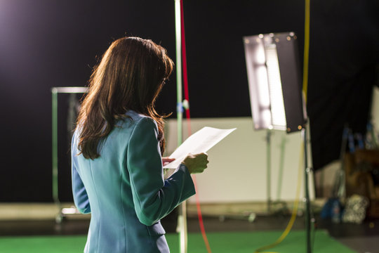 Actress Holding Script Rehearsing In Set