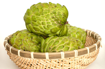 Custard apples in a bamboo basket