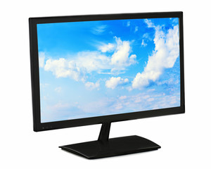 Black lcd monitor with blue sky isolated on white background.