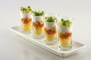 verrine of cheese on a white plate