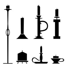 Set of stencil candlesticks with candles