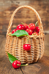 Fototapeta na wymiar basket of ripe cherries