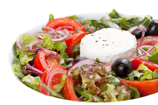 Salad with vegetables, olives and cheese