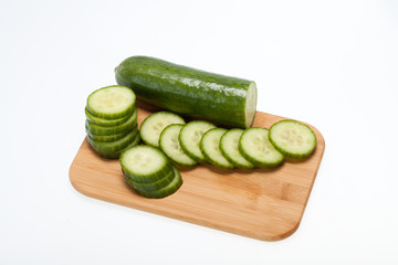 The green cucumber isolated on white background