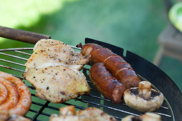 barbecue with delicious grilled meat on grill
