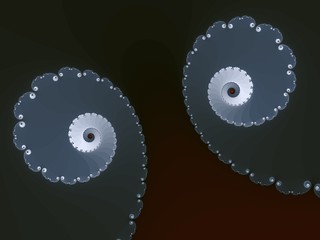 Two fractal spiral on a dark background