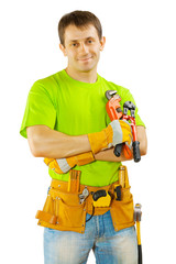 a worker holding tools