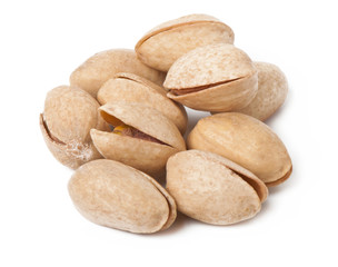 Handful of pistachios isolated on white background