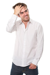 Fototapeta premium Handsome young man smiling with hand in hair