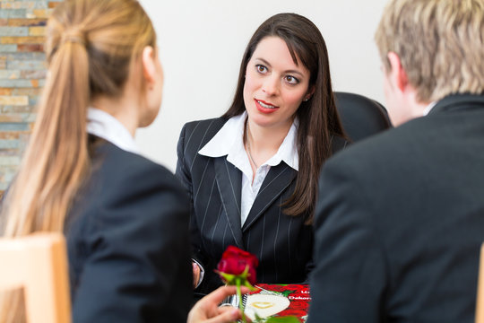 Mortician With Client Comforting And Advising