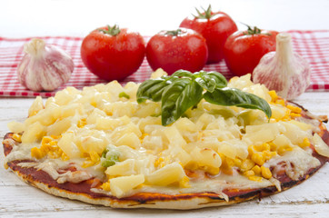 pizza with pineapple and sweet corn