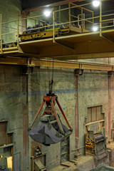 Naklejka premium Industrial crane in a power plant