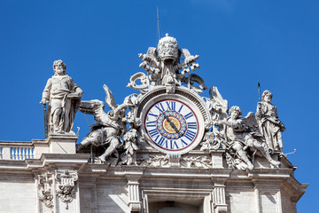 Fototapeta na wymiar Clock On The Top Of St. Peter's Basilica