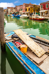Fototapeta na wymiar Boat On Canal In Murano