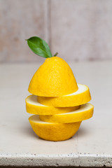 Sliced lemon on table.