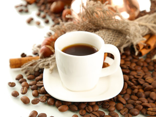 Cup of coffee and coffee beans, isolated on white