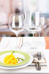 Table setting with glasses for different drinks