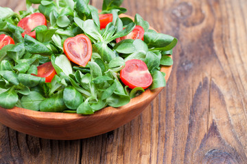 Fresh salade on wooden background
