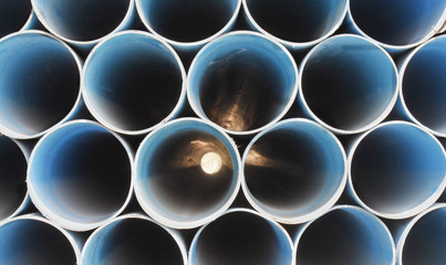 PVC pipes stacked in construction site