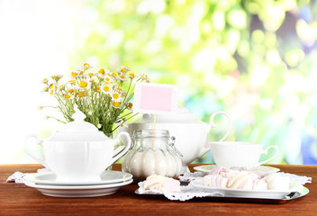 Table setting with chamomiles