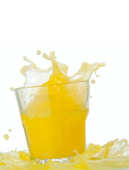 Naklejka na ściany i meble glass of splashing orange juice isolated on white