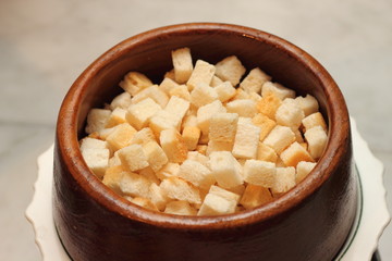 mini bread in a wood bolw