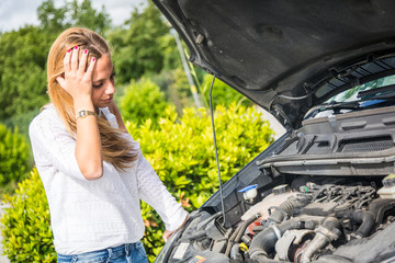 Young Woman with Damaged Car