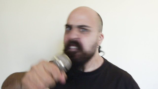 angry hard rock long bearded singer