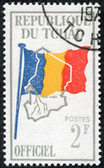 stamp printed by Chad, shows Flag and Map of Chad © cityanimal