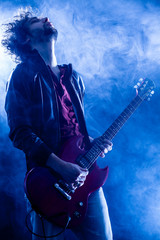 Young Man Playing Electric Guitar