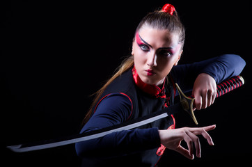 Woman in japanese martial art concept © Elnur