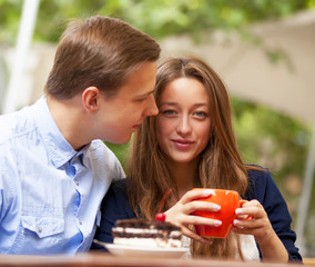 young couple in the cafe