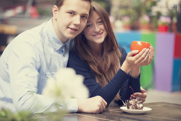 young couple in the cafe