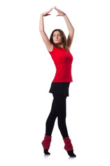 Young gymnast exercising on white