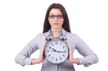 Woman with clock isolated on white