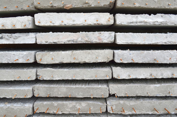 concrete plates laying on the ground at building site