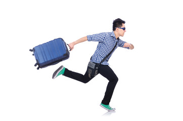Young guy with travel case on white