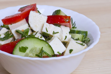 low-calorie salad with fresh vegetables and cheese