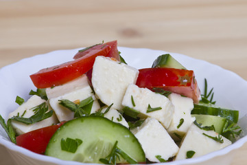 low-calorie salad with fresh vegetables and cheese