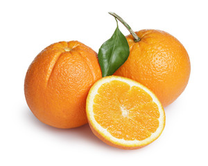 ripe round oranges with half, stem and leaf
