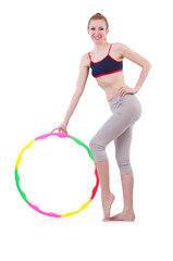 Woman doing exercises with hula hoop