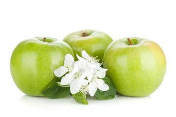Ripe green apples and flowers