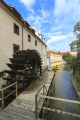 Fototapeta na wymiar Small Venice in Prague, canal and watermill