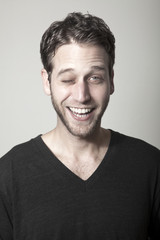 Fototapeta premium Mrugający facet