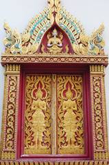 Fototapeta na wymiar Thai temple window in Chiang Mai