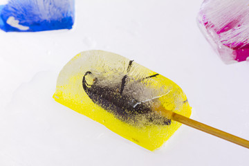 Yellow, blue and pink beetle ice creams