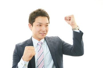 ガッツポーズのビジネスマン