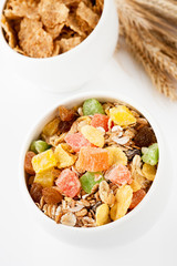 Granola (muesli flakes) and ears of wheat