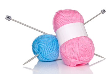 Balls of wool and knitting needles.